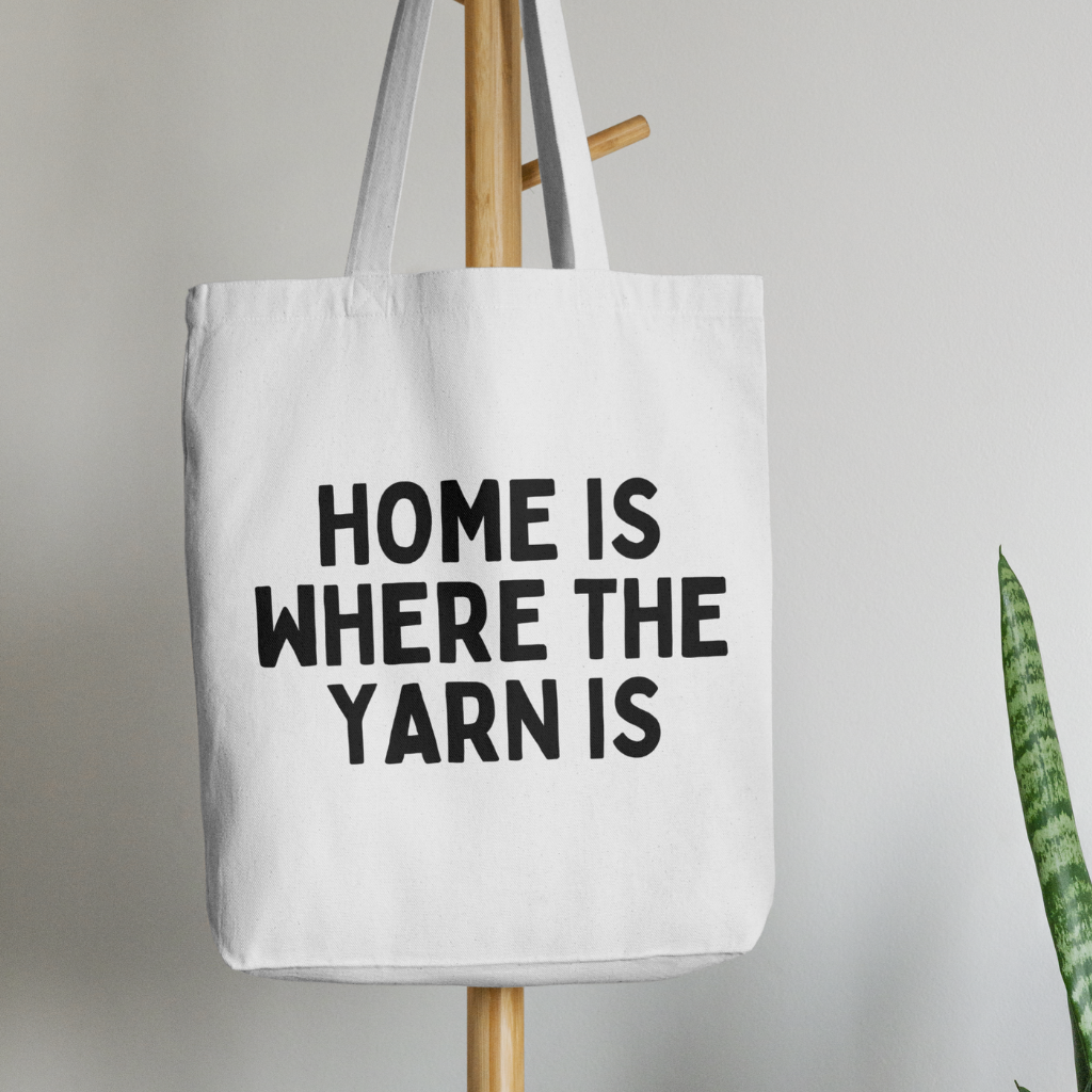 "Home is Where the Yarn Is" – White Tote Bag for Knitters & Crocheters